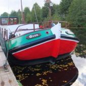 ingezonden door Ole Pfeiler - De tjalk in karakteristieke kleuren op het Nord-Georgsfehn-Kanal